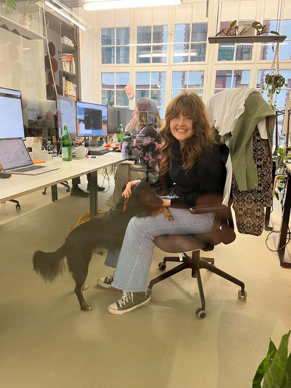 Woman in the office with a dog